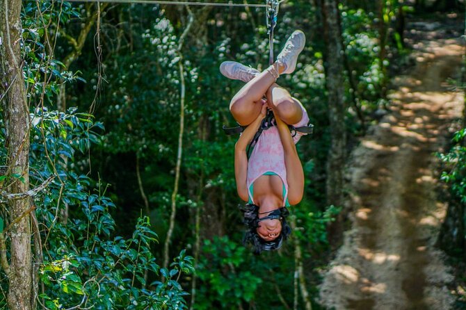 Shared ATV's and Zip Lines and Swimming in a Real Cenote. - The zipline and hanging-bridge circuit