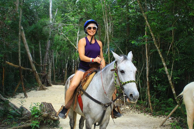 Single ATV, Horseback Riding, Ziplines and Cenote Swim - Horseback riding through the trees