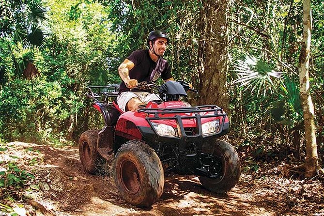 Snorkel, ATV, Zipline and Cenote Adventure from Cancun - Swimming in the small limestone cenote
