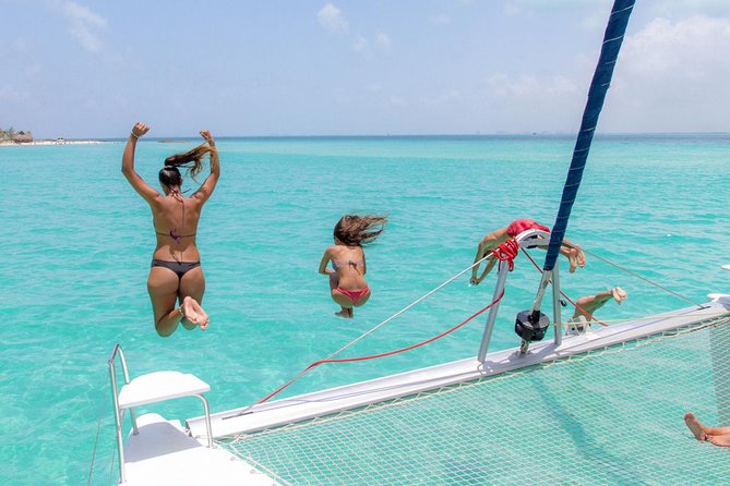 Snorkeling Adventure at Isla Mujeres Includes Lunch and Open Bar - Sailing across the Caribbean Sea