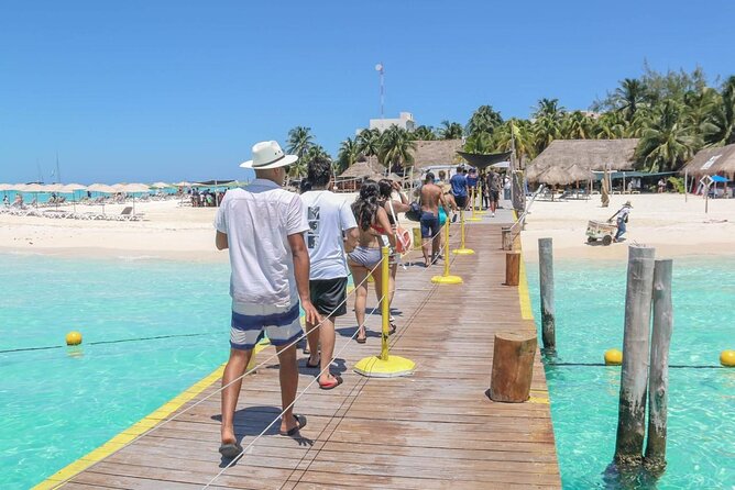 Splendid Isla Mujeres Catamaran: drinks and fun all day! - Ninety minutes to see Isla Mujeres
