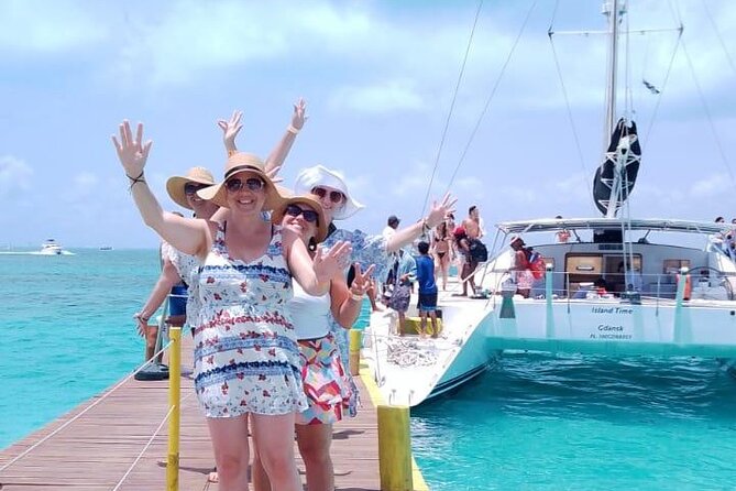 Splendid Isla Mujeres Catamaran: drinks and fun all day! - The ride back with music and sunset views