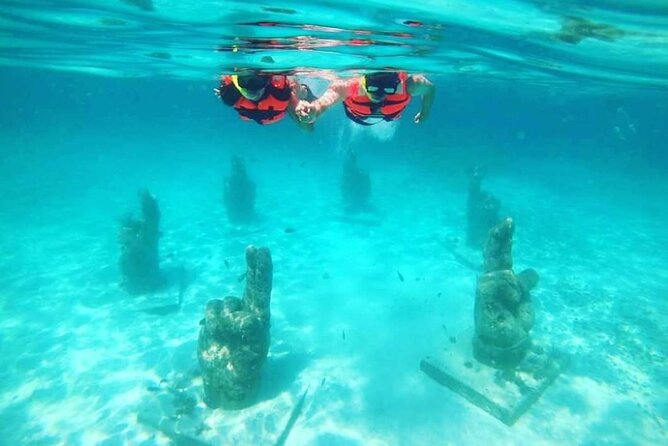 Splendid Isla Mujeres Catamaran: drinks and fun all day! - Who will enjoy this day most