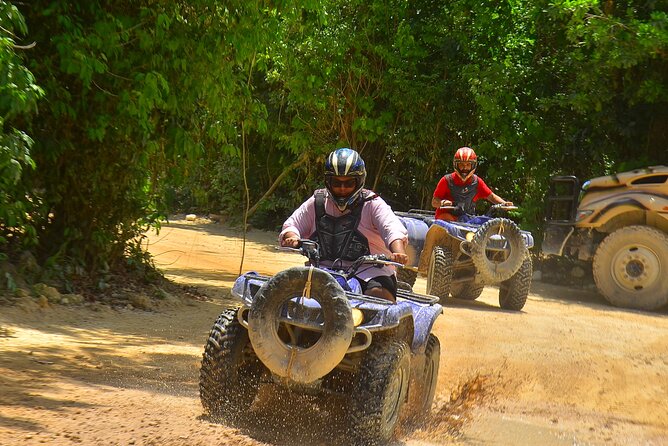 Top ATV's in Mexico includes Cenote, Ziplines, snack & transport. - A cenote with a jump or safe entrance