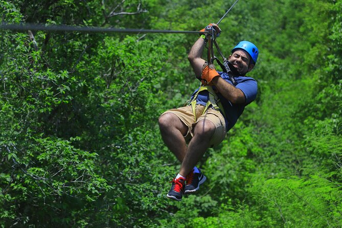 Top ATV's in Mexico includes Cenote, Ziplines, snack & transport. - Ziplines above the trees