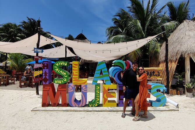 Top Isla Mujeres Catamaran Tour with Snorkel Open Bar and Buffet lunch - The long return sail and sunset views