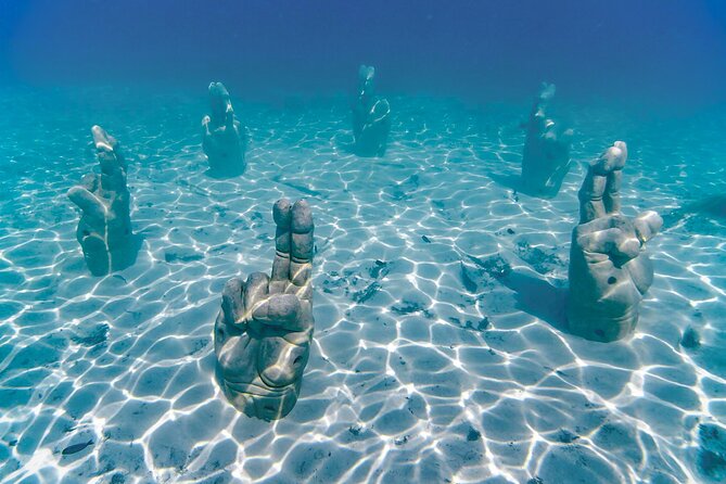 Top Isla Mujeres Catamaran Tour with Snorkel Open Bar and Buffet lunch - The true cost and overall value