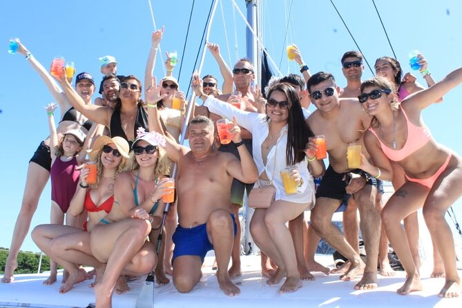 Top Isla Mujeres Catamaran Tour with Snorkel Open Bar and Buffet lunch - Boarding the catamaran and settling in