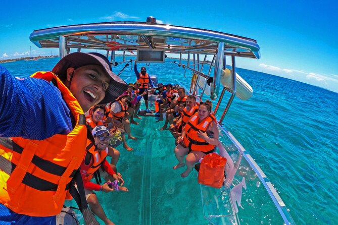 Tour Isla Mujeres excursion in Collective Transparent Boat - Starting at Marina Bartolomé in central Isla Mujeres
