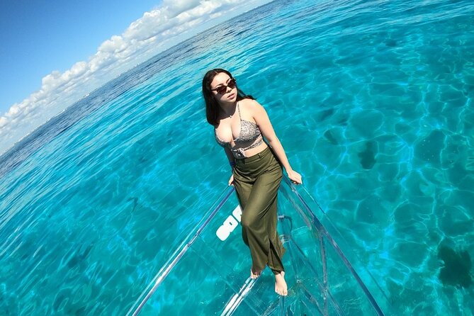 Tour Isla Mujeres excursion in Collective Transparent Boat - Family comfort and the small-group setup