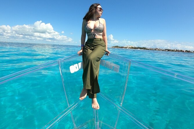 Tour Isla Mujeres excursion in Collective Transparent Boat - Marine life, photos, and weather