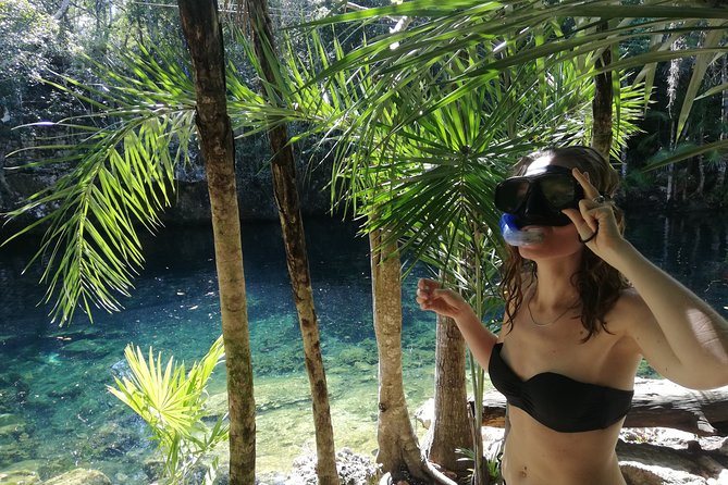 Tulaka Cenote Experience - The open-air cenote and its bright reflections
