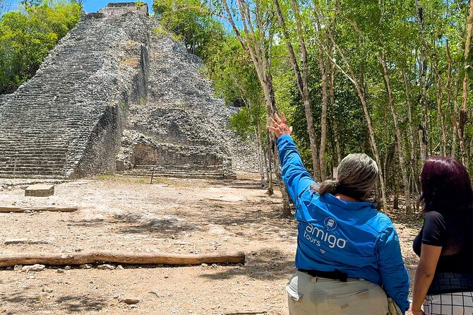 Tulum & Coba with Cenote, Cave Exploration, Lunch & Tastings - Tulum’s cliffside ruins and Caribbean view