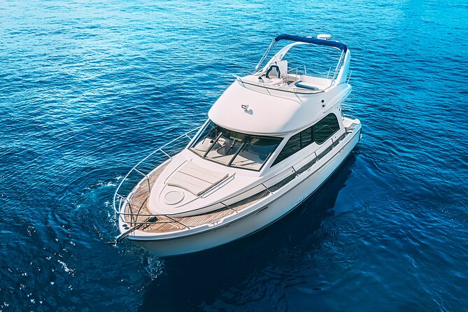 Yacht Meridian 40FT Best Private Rental in Cancun - Crew service, music, drinks, and comfort