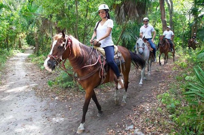 Ziplining and Horseback Riding Experience from Cancun and Playa del Carmen - Choosing a horse and following the forest trail