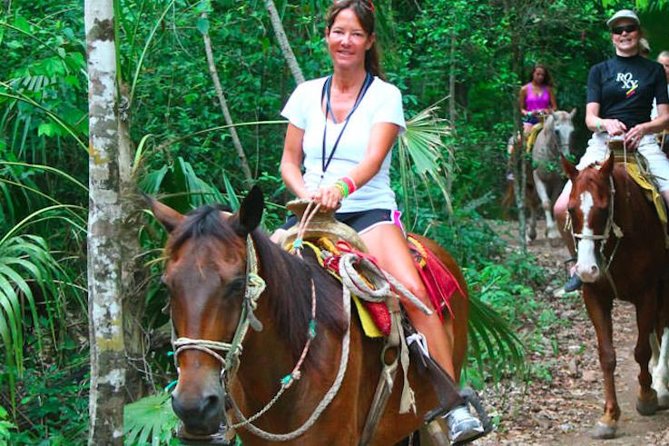 Ziplining and Horseback Riding Experience from Cancun and Playa del Carmen - Ziplining above the trees
